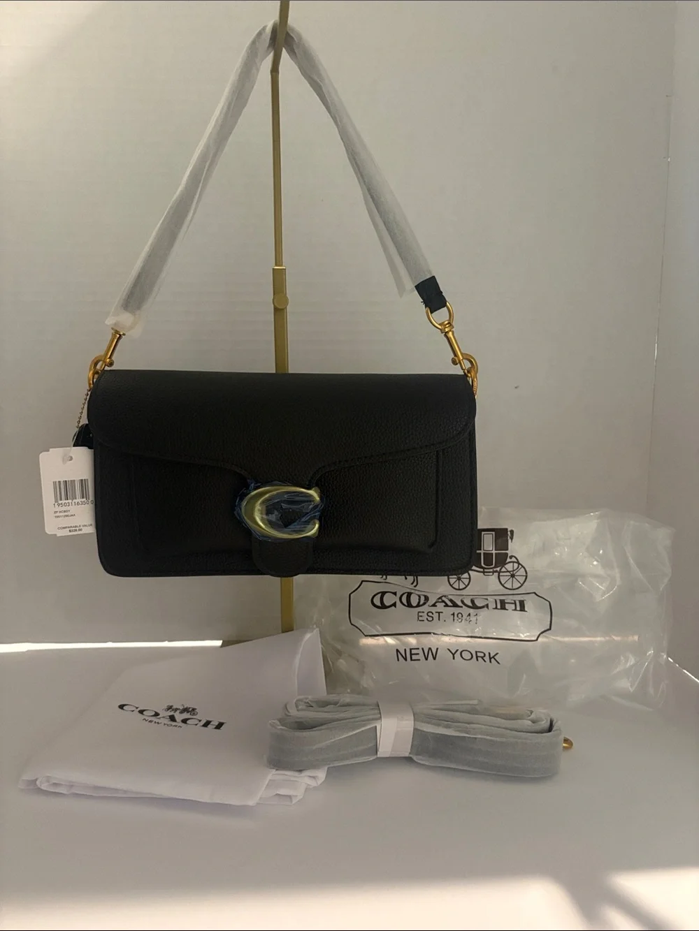 Coach Black Pebbled Leather Shoulder Bag with Gold-Tone 'C' Clasp